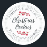 Rustic Homemade Christmas Cranberry Cookies  Classic Round Sticker<br><div class="desc">Rustic and modern homemade baked goods sticker with the text homemade with love, christmas cookies and your name in off-black handwritten script calligraphy and modern typography on a white background with a stylish touch of cranberries sprigs. Simply add your name and the product name to the label. Exclusively designed for...</div>