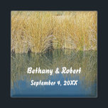Rustic Lake Grass Reflection Outdoor Wedding Magnet<br><div class="desc">Give your guests a unique keepsake from your wedding day with these personalised magnets. This beautiful nature magnet features a photo of tall brown and green lake grass along the lakeside shore reflected in the blue water. The bride and groom's names and the wedding date appear in the water in...</div>