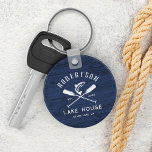 Rustic Lake House Family Name Blue Wood Key Ring<br><div class="desc">This personalised rustic family lake house keychain features crossed oars and a jumping fish on a rustic navy blue wood background,  with family name,  lake house location and established date in easy to use text templates.</div>