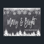 Rustic Merry and Bright Chalkboard Typography Announcement Postcard<br><div class="desc">Elegant design featuring an elegant,  modern "Merry and Bright" typography,  on a chalkboard background with snowflakes and trees. Use Customise tool to add your info,  message. More ideas in my Christmas Photo Collection.</div>