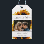 Rustic modern sunflowers wedding photo save date gift tags<br><div class="desc">Beautiful and easy to personalise photo wedding save the date favour gift tag with vibrant yellow-gold hand-painted sunflowers and elegant stripes with a trendy modern script over a clear white background. Suitable for summer and autumn fall garden backyard outdoor rustic modern weddings. The colours are changeable. If you need to...</div>