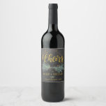Rustic modern winter chalkboard cheers wedding wine label<br><div class="desc">Cheers gold typography script and rustic modern winter wreath with pine bough and dried branches with your name / names and wine sort on dark grey chalkboard background making an inspired personalised wine label for your rustic winter nature,  evergreen,  forest wedding or other winter night events.</div>