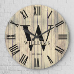 Rustic Monogram Farmhouse Custom Family Name Large Clock<br><div class="desc">Personalised Family Name, monogram, and year established Rustic Modern Wall clock in a trendy farmhouse style design with roman numeral clock face and light white wood plank / shiplap backdrop design. Perfect gift for newlyweds, wedding or housewarming present or grandparents gift, or for a home make-over in your cabin, cottage,...</div>