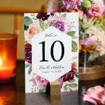 Rustic Pink Burgundy and Purple Floral Wedding Table Number<br><div class="desc">Elegant floral table number cards featuring the table number and your wedding details inside a geometric frame of watercolor roses and greenery in shades of blush pink, peach, burgundy, purple & green. Personalise by adding your names and wedding date. The design repeats on the back of the card. Designed to...</div>