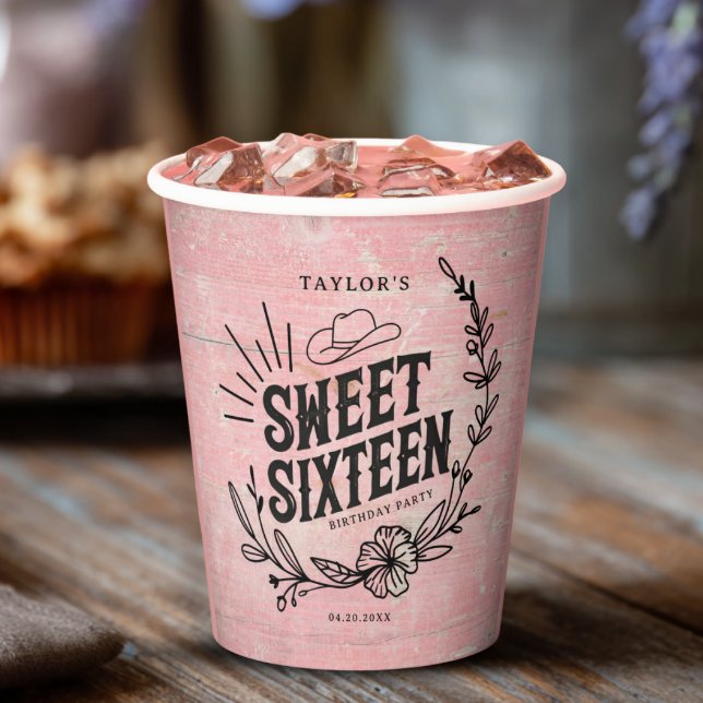 Rustic Pink Western Cowgirl Sweet Sixteen Birthday Paper Cups (Rustic pink sweet sixteen party cup with floral design on wooden table and flower decor.)