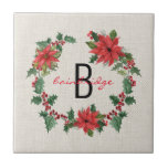 Rustic Poinsettia & Holly Wreath Monogrammed Tile<br><div class="desc">A festive, poinsettia and holly Christmas wreath surrounds initial and name on this rustic, tile. You can easily personalise your tile using Zazzle's easy to use design tool. Background is a simple, natural burlap. Makes a very thoughtful Gift. Part of a collection.</div>