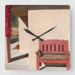 rustic red bench on a clock