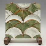 Rustic Scales Faux Relief Ceramic Tile<br><div class="desc">This beautifully crafted ceramic tile offers the allure of a textured relief with the convenience of a flat surface. The design features a series of overlapping scales in a variety of earthy greens, from olive to sage, with touches of creamy off-white and accents in russet brown where each scale seems...</div>