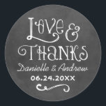 Rustic Script Love and Thanks Chalkboard Wedding Classic Round Sticker<br><div class="desc">Charming chalkboard favour stickers feature "Love & Thanks" with a custom wedding monogram in handwritten style fonts that have a white chalk appearance. Background has a rustic black board textured appearance.</div>