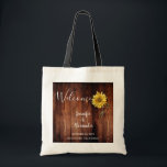 Rustic sunflower on wood Welcome wedding Tote Bag<br><div class="desc">Rustic sunflower on barn wood wedding welcome tote bag.
Nice welcome bag for your wedding guests.
Add your own names and text and create a very personal and unique wedding bag.</div>