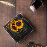 Rustic sunflowers barn wood lights wedding favour glass coaster<br><div class="desc">Rustic country vintage traditional style personalised drink coaster with big yellow gold sunflowers and strings of twinkle lights on a dark brown barn wood background and with elegant gold typography script.             Newlyweds gift or favour for summer or autumn fall | elegant rustic country | outdoor garden backyard themed weddings.</div>