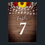 Rustic Sunflowers Roses Jar Lights Wedding Table N Table Number<br><div class="desc">This wedding design features a mason jar vase filled with red roses, sunflowers and baby's breath on a rustic wood background with string lights. Click the customise button for more flexibility in modifying the text. Variations of this design, different paper types, as well as coordinating products are available in our...</div>