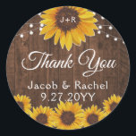 Rustic Sunflowers String Lights Wood Wedding Classic Round Sticker<br><div class="desc">This wedding design features pretty painted, watercolor sunflowers on a rustic wood background accented with string lights. Click the customise button for more flexibility in modifying the text or moving the graphics! Variations of this design as well as coordinating products are available in our shop, zazzle.com/store/doodlelulu. Contact us if you...</div>