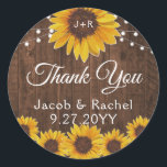 Rustic Sunflowers String Lights Wood Wedding Classic Round Sticker<br><div class="desc">This wedding design features pretty painted, watercolor sunflowers on a rustic wood background accented with string lights. Click the customise button for more flexibility in modifying the text or moving the graphics! Variations of this design as well as coordinating products are available in our shop, zazzle.com/store/doodlelulu. Contact us if you...</div>