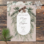 Rustic Tan Pine Winter Sparkle Wedding Save The Date<br><div class="desc">This design features a rustic green pine and pinecone bouquet on a soft beige background with white flowers. It is accented with a white sparkle overlay to illustrate the magic of the beautiful winter holidays. Perfect for a Christmas or winter wedding. This card is part of the Rustic Tan Pine...</div>