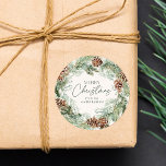 Rustic Watercolor Pine Cone Wreath Merry Christmas Classic Round Sticker<br><div class="desc">Elegant holiday stickers featuring a watercolor wreath of pine cones, pine boughs, and lush greenery with a light cream background. "Merry Christmas" is displayed in a dark green script with your name shown below. The rustic Christmas stickers are perfect to use for envelope seals, Christmas party favours, holiday crafts, and...</div>