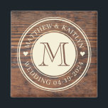 Rustic Wedding Heart Monogram in Dark Walnut Magnet<br><div class="desc">Elevate your rustic wedding décor with the Rustic Wedding Heart Monogram in Dark Walnut Magnet. This charming magnet features a heart monogram design set against a rich dark walnut background, adding a personalised touch to any magnetic surface. Whether used to secure important notes or to adorn your refrigerator with sentimental...</div>