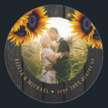 Rustic wedding photo personalised sunflowers wood classic round sticker<br><div class="desc">Rustic country wedding round photo create your own favour gift label or envelope seal with yellow gold sunflower bouquets over a dark brown barn wood.            Easy to customise with your text and photo!           Perfect for a rustic country farmhouse barn wedding invitation or favour.</div>