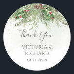 Rustic Winter Greenery Berries Pine Cone Wedding Classic Round Sticker<br><div class="desc">Express your gratitude to your guests in a festive way with these winter greenery thank you stickers. These self-adhesive stickers feature a charming design of pine branches and berries, adding a touch of holiday cheer to your wedding favours, bomboniere, or thank you cards. Personalise the stickers with the names of...</div>