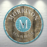 Rustic Wood Blue Family Name  Dartboard<br><div class="desc">This rustic dartboard is the perfect addition to your family beach house, lake house, game room, man cave, and more. It features a bold initial monogram at the centre, with your family name proudly displayed at the top. The bottom reads "Beach House, " but this can be customised to fit...</div>