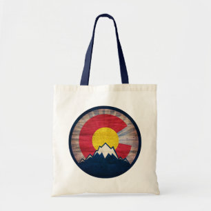Rustic wood Colorado flag mountains tote bag