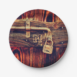 Rustic wood door with antique brass lock paper plate