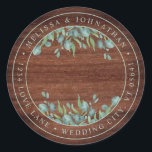 Rustic Wood Eucalyptus Greenery Return Address Classic Round Sticker<br><div class="desc">Add the finishing touch to your wedding invitations and invite friends and family to your wedding with these rustic chalkboard and eucalyptus wedding invitation return address labels. Personalise with names, and address. These unique greenery wedding return address labels will make a lasting impression. COPYRIGHT © 2020 Judy Burrows, Black Dog...</div>