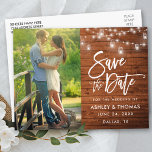 Rustic Wood Jar Lights Brush Script Save The Date Postcard<br><div class="desc">Modern Brush Script,  Rustic Wood,  String Lights with Mason Jars,  Save The Date Engagement Couple Photo Postcard</div>