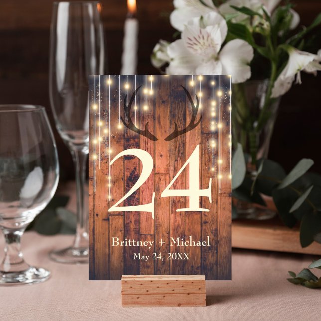 Rustic Wood String Light Antler Table Card (Rustic wood string lights antler design table number card is perfect for your wedding reception.)