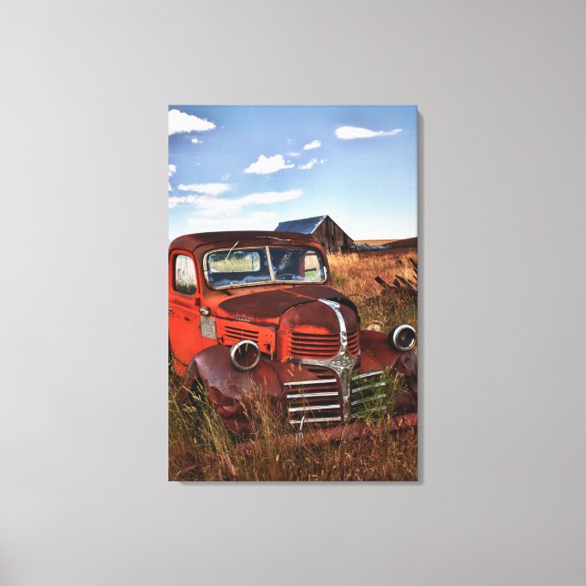Rusting orange Dodge truck with abandoned farm Canvas Print (Front)