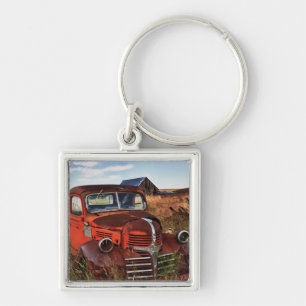 Rusting orange Dodge truck with abandoned farm Key Ring