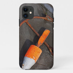 Rusty Anchor And Buoy On A Beach iPhone 11 Case