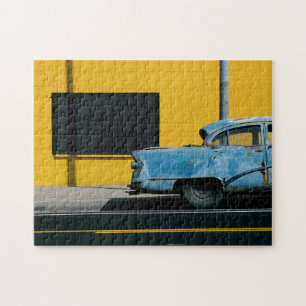 Rusty Blue Car and Yellow Wall Jigsaw Puzzle