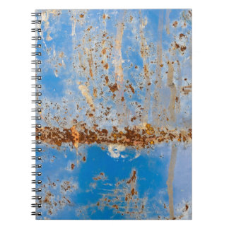 Rusty metal texture, blue scratchy decor. notebook