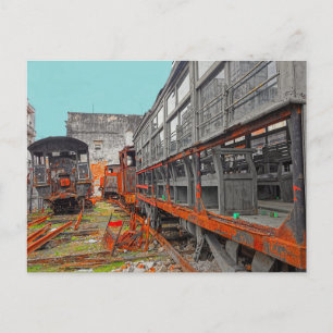 Rusty old locomotives and train wagons postcard
