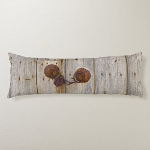 Rusty vintage old iron padlock on a wooden door _ body cushion