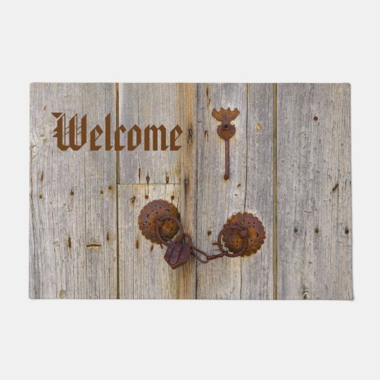Rusty vintage old padlock on wooden door Welcome Doormat
