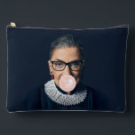 Ruth Bader Ginsburg Blowing Pink Bubble gum    Accessory Pouch<br><div class="desc">Ruth Bader Ginsburg blowing a pink bubble gum with dark blue background.
This artwork is inspired by the iconic Ruth who blazed a trail for women in U.S. Jurisprudence.</div>
