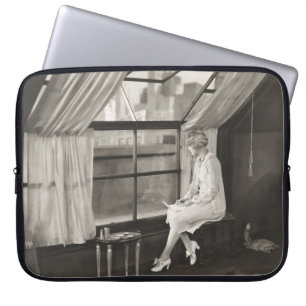 Sad woman staring out window1940s, woman, vintage, laptop sleeve