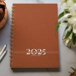 Saddle Brown Overlapping Text Split Year Weekly Planner<br><div class="desc">Simple personal stationery 2025  annual/weekly planner featuring bold year digits split by a line of text (name,  subject,  etc). Annual planner (12 months) with open monthly overviews and weekly planning sheets. Cover in a curated selection of modern colours. Contact for assistance in personalising or creating special colour combination.</div>