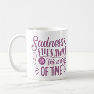 SADNESS FLIES AWAY ON THE WINGS OF TIME COFFEE MUG