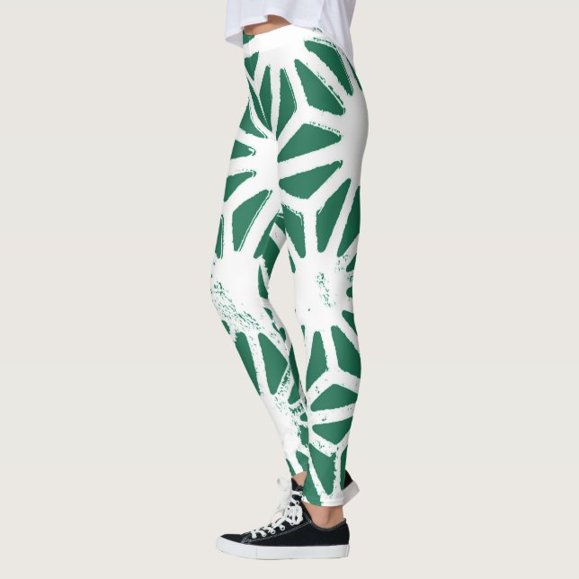 Sage green and white geometric pattern leggings (Left)