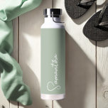 Sage Green and White Personalised Water Bottle<br><div class="desc">Stay stylish and hydrated with these sage green water bottles, featuring your personalised handwritten name in elegant white script over a chic modern background. This custom insulated bottle is perfect for keeping drinks cold in summer and warm in winter, making it a cute gift for her, whether for a bride,...</div>