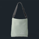 Sage Green Minimalist Modern Monogram Elegant  Crossbody Bag<br><div class="desc">Introducing our Sage Green Minimalist Modern Monogram Elegant Collection: Elevate your aesthetic with serene sophistication and timeless elegance. Our collection showcases minimalist designs in a tranquil sage green hue, complemented by refined monograms tailored to your personal style. From polished stationery to versatile accessories, each piece in our collection is meticulously...</div>