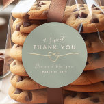 Sage Green Sweet Thank You Wedding Sticker<br><div class="desc">Add a charming touch to your wedding favours with this elegant sage green "A Sweet Thank You" sticker. Featuring a romantic gold rope heart, modern script, and your names and date, it's perfect for cookie bags, candy boxes, and homemade treats. A stylish way to show gratitude on your special day....</div>