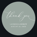 Sage Olive Green Minimalist Wedding Thank You Classic Round Sticker<br><div class="desc">Our modern minimalist thank you sticker/seal has "thank you" written in modern calligraphy script and can be fully customised with your name,  dates and background colour.</div>