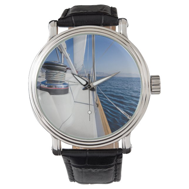 sail vessel surfing on the sea watch (Front)