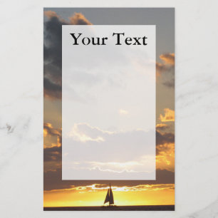 Sailboat at sunset writing paper