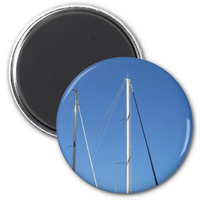 Sailboat masts in the marina against a blue sky magnet (Front)