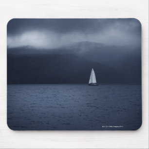 Sailing boat in stormy weather in Scottish Mouse Mat